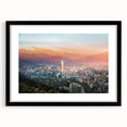 Extra large abstract art print depicting a colorful, textured view of Santiago, Chile, in a black frame with mat.