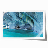 Rolled print of a Chilean landscape featuring lush greenery and distant mountains, in muted earth tones.