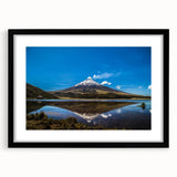 Abstract art print featuring colorful, textured scenery of South America on a large black-framed canvas.