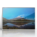 Art deco poster of a scenic South American landscape, with lush green tones, in a white acrylic frame.