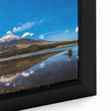 Extra large framed canvas depicting a textured black wall art scene of South America, highlighted with colorful.