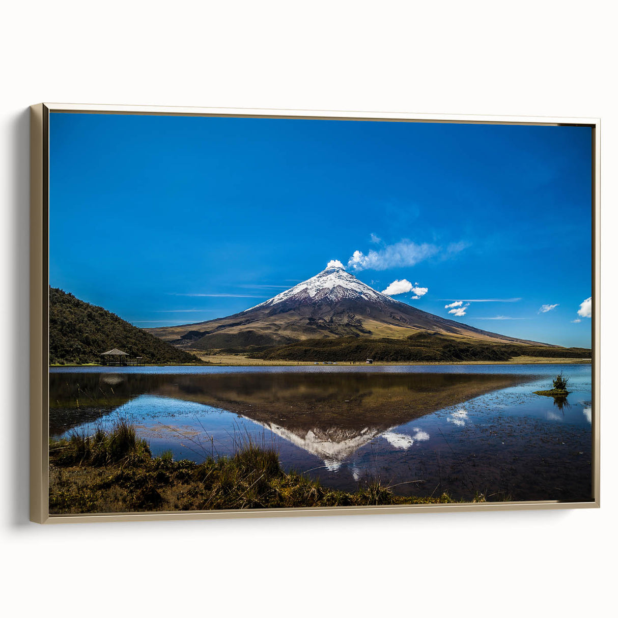 Framed canvas featuring a vintage-style landscape painting of an Ecuadorian scene in muted gold and black tones.
