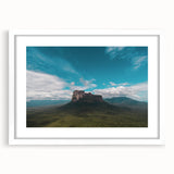 Abstract art print of a Venezuelan landscape in muted earth tones on a framed white canvas, ideal for dining room decor.