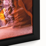Close-up of a textured black wall art depicting Arizona's Antelope Canyon in vibrant, colorful hues on a framed canvas.