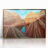 Large art print of Coyote Buttes in Arizona, featuring earthy red and orange tones on a framed acrylic.