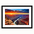 Colorful abstract art print of the Grand Canyon on textured canvas, framed in black, ideal for living room decor.