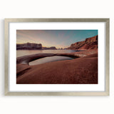 Textured art of Lake Powell with abstract earth tones, framed in silver, ideal for bedroom wall decor.