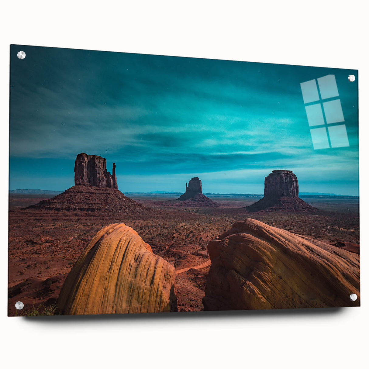 Acrylic print of Monument Valley with vibrant red and orange tones, suitable for bedroom or dining room decor.