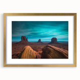 Extra large framed wall art of Monument Valley in muted earth tones, ideal for living room decor.