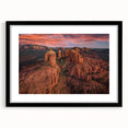 Abstract art print of Sedona landscape with vibrant, colorful textures on a large framed canvas, ideal for living room decor.