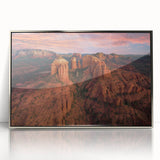 Mid-century modernist art depicting the Sedona landscape in muted earth tones on a silver-framed acrylic print.