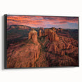 Black and white framed canvas featuring a vintage-style landscape painting of Sedona, Arizona, ideal for bedroom decor.