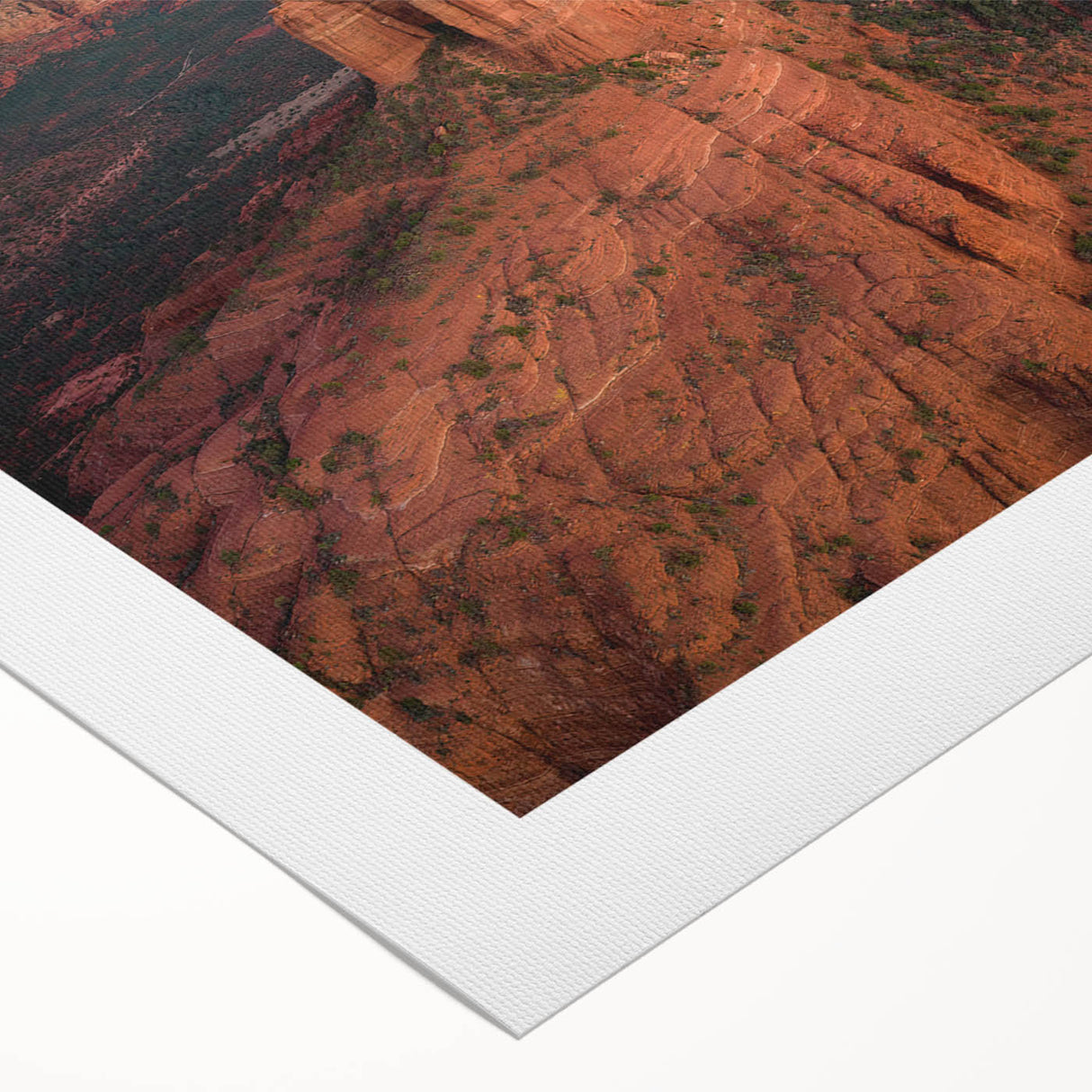Art deco poster of Sedona landscape in earthy red and orange tones on rolled canvas, suitable for dining room wall art.