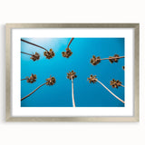 Textured art print of abstract Beverly Hills scenery in muted earth tones, framed in silver, ideal for bedroom decor.