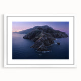 Abstract art print of Catalina, California in muted blue and green tones on a framed white mat, ideal for dining room decor.