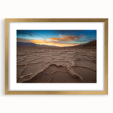 Extra large abstract art print of Death Valley in textured earth tones on a gold-framed canvas, ideal for living room decor.