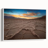 Framed canvas of vintage poster art depicting Death Valley in muted earth tones, ideal for living room decor.