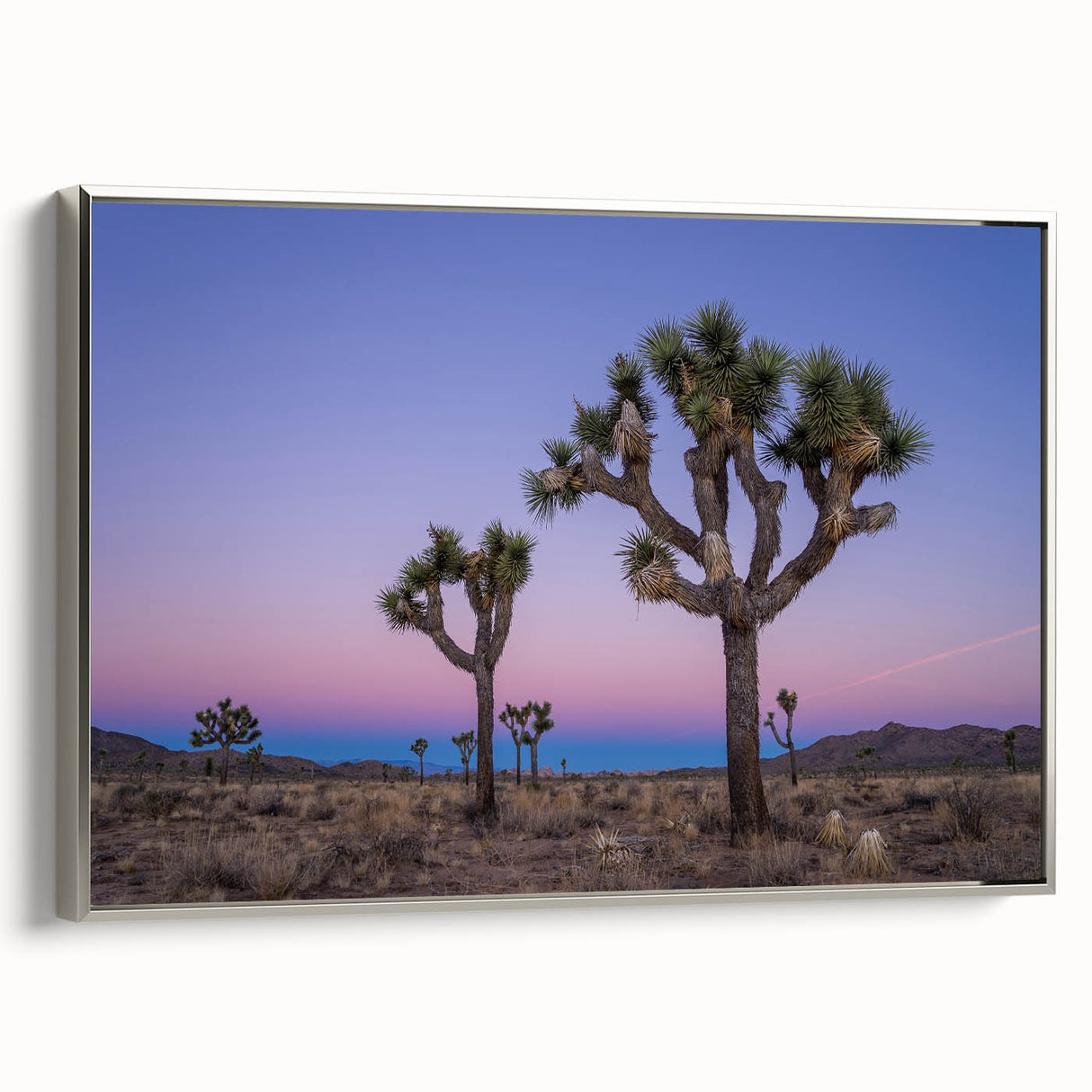 Landscape art painting of Joshua Tree, featuring muted earth tones on a framed canvas.