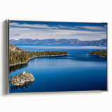Framed canvas depicting a vintage-style landscape of Lake Tahoe with a palette of blues and greens.