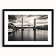 Abstract art print of Sacramento scenery in vibrant multicolor on textured canvas, framed in black.