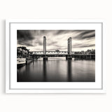 Abstract art print of Sacramento scenery in muted earth tones on a white framed canvas, suitable for dining room decor.