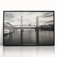 Large abstract wall art depicting the Sacramento skyline in muted gray and blue tones, framed in black acrylic.