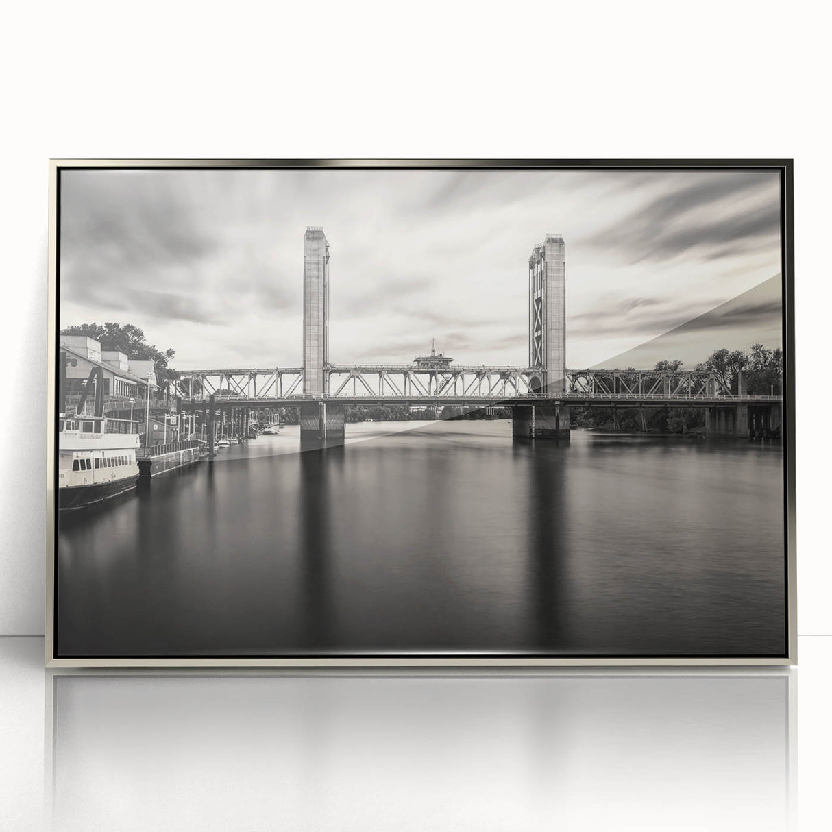 Mid-century modernist art depicting Sacramento skyline in muted silver tones on a framed acrylic print.