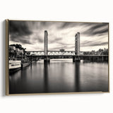 Framed canvas featuring a vintage-style landscape painting of Sacramento, with muted gold and black tones.