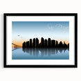 Extra large abstract art print of San Diego skyline in vibrant colors on a textured canvas, framed in black.
