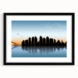Extra large abstract art print of San Diego skyline in vibrant colors on a textured canvas, framed in black.