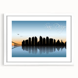 Abstract art print of San Diego skyline in muted blue and gray tones on a framed white mat, ideal for dining room decor.