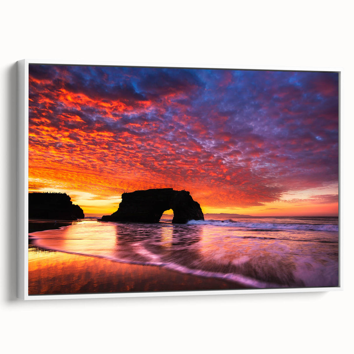 Vintage poster art of Santa Cruz with vibrant colors on a large framed canvas, ideal for living room decor.