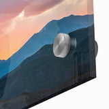 Large abstract wall art of the Rocky Mountains in muted earth tones on acrylic glass, ideal for dining room decor.