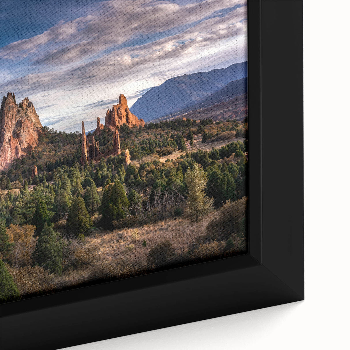 Extra large framed canvas of Colorado Springs scenery in textured black with colorful accents, ideal for living room decor.