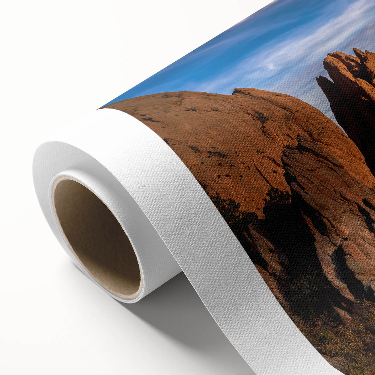 Art deco poster of Colorado Springs landscape on rolled canvas, featuring muted green and blue tones.