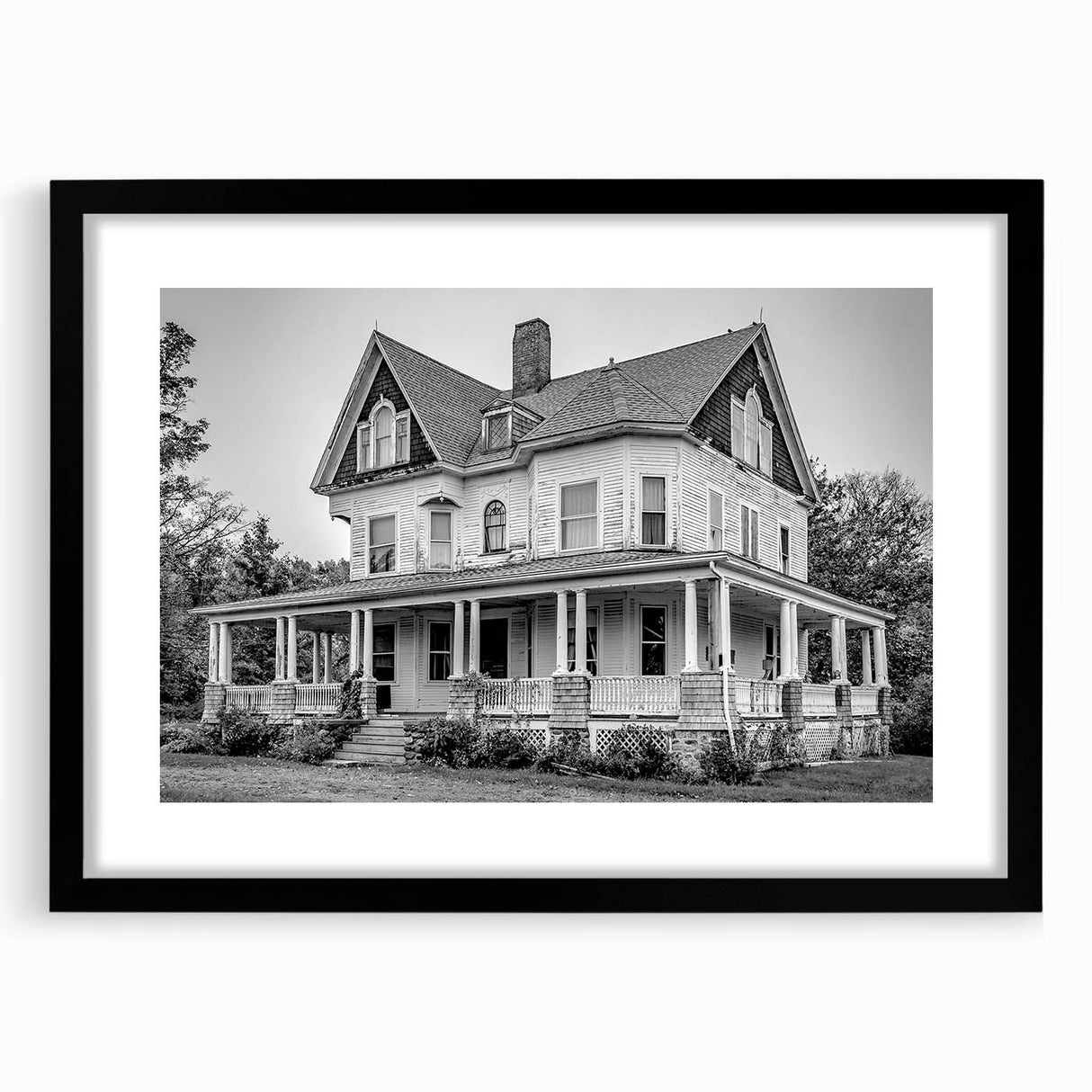 Abstract art print featuring a colorful, textured depiction of a Connecticut scenery on a large black-framed canvas.
