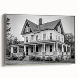 Framed canvas featuring a vintage-style Connecticut landscape in black with colorful accents, ideal for living room decor.