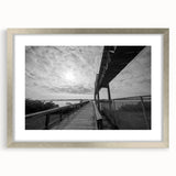 Textured abstract art print of Delaware scenery in muted earth tones on a framed silver mat, suitable for bedroom decor.