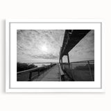 Abstract art print of Delaware scenery in muted green and blue tones on a white framed canvas.