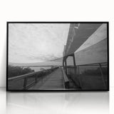 Large abstract wall art featuring a Delaware scenery in muted earth tones on a black framed acrylic print.