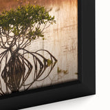 Close-up of black wall art featuring textured Everglades scenery on framed canvas, ideal for living room decor.