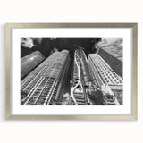 Textured abstract art print of Miami skyline in muted blue and silver, framed with a mat, suitable for bedroom decor.