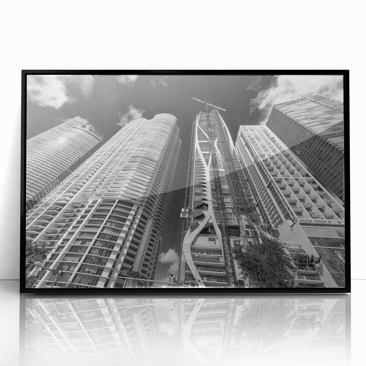 Large abstract wall art depicting vibrant Miami scenery in mid-century modernist style, acrylic print in black frame.