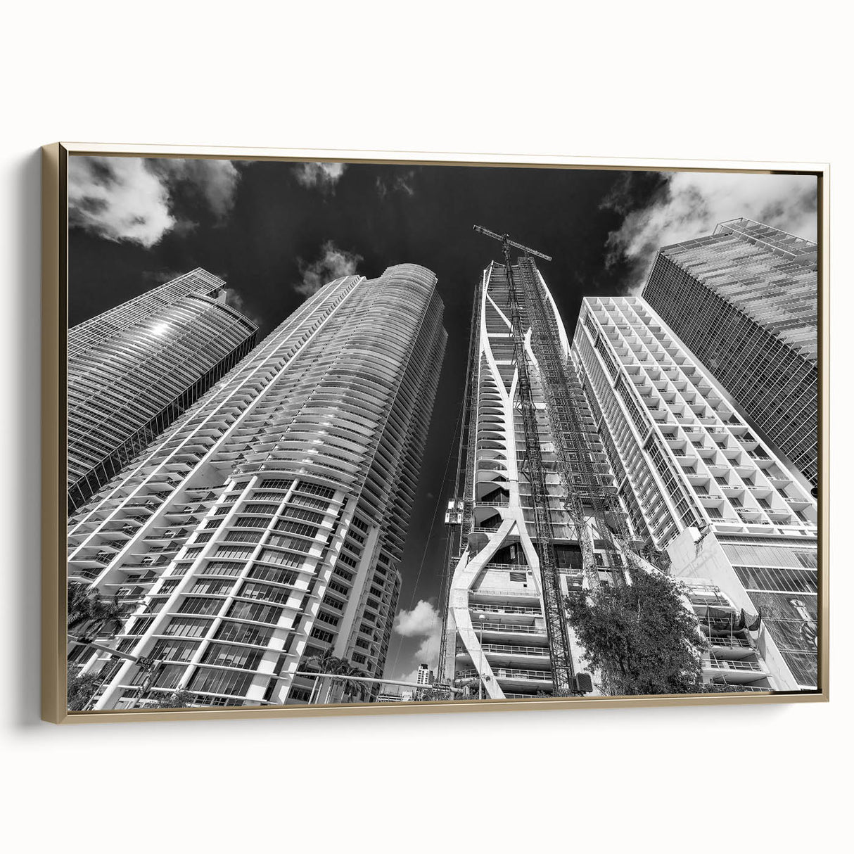 Framed canvas of a vintage-style Miami landscape in black and gold tones, ideal for bedroom wall art.