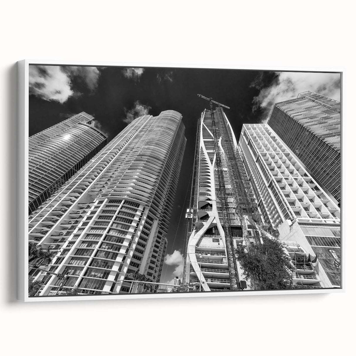 Vintage poster art of Miami with colorful skyline, in a white-framed canvas, suitable for living room decor.