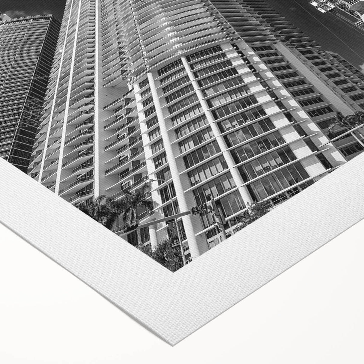 Art deco poster of Miami skyline in pastel shades on rolled canvas, ideal for dining room wall art.