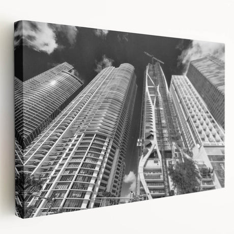 A panoramic view of the Miami skyline in muted blue and pink tones on a large stretched canvas.
