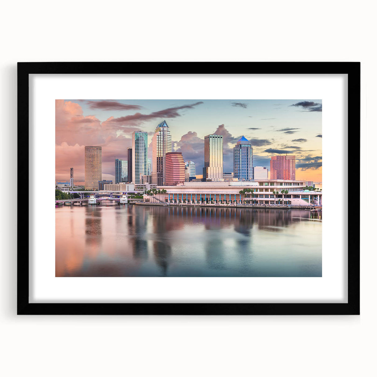 Abstract art print depicting a colorful, textured scenery of Tampa, framed in black, ideal for living room decor.