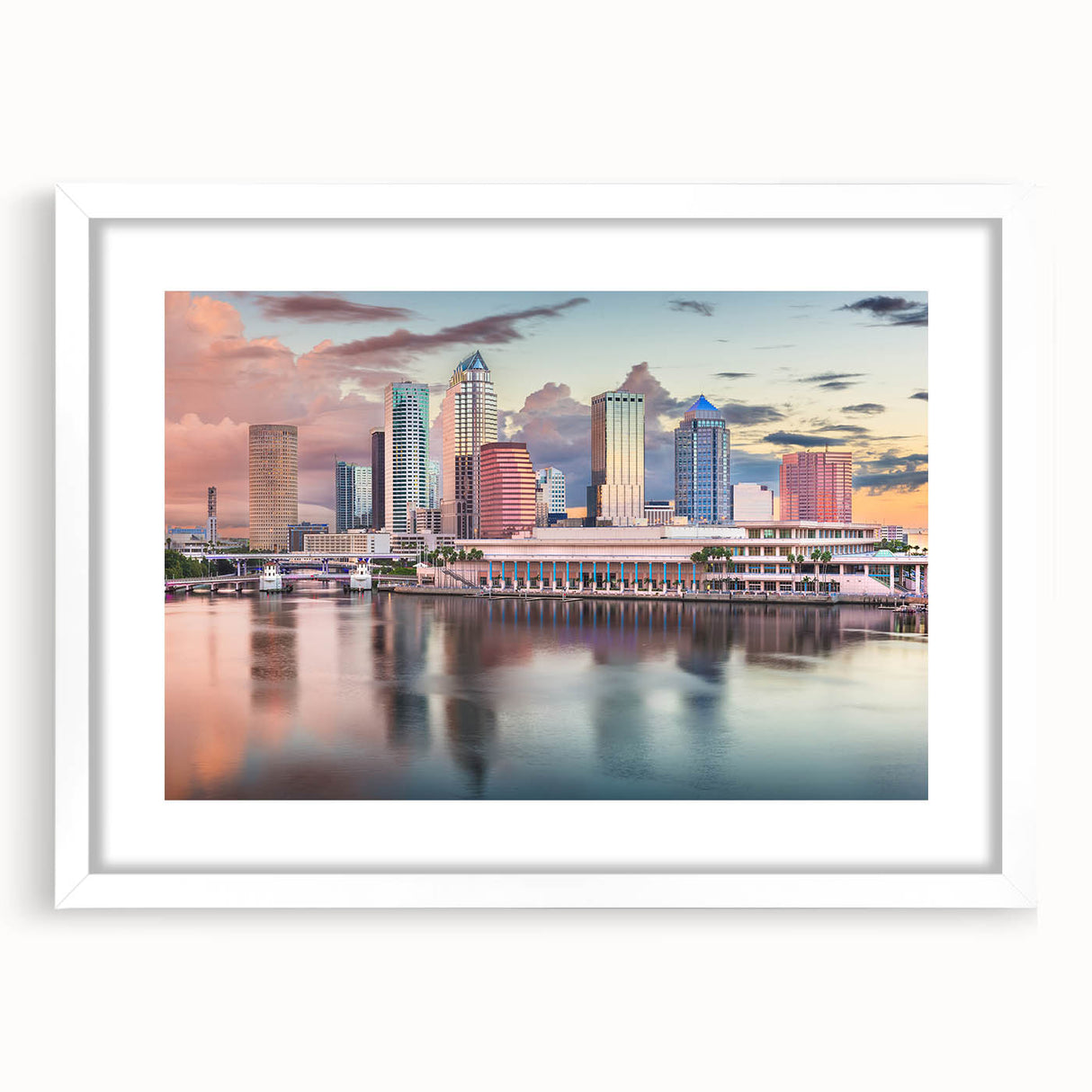 Abstract art print of Tampa skyline in muted blue and gray tones on a framed white mat.