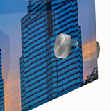 Large abstract depiction of the Atlanta skyline in muted gray and blue tones on acrylic glass, suitable for dining room art.